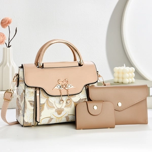 Elegant 3-piece beige handbag set with floral embroidery and swan pearl tassel charm