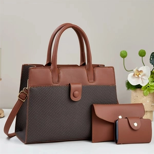 3-piece brown leather handbag set with grey fabric panel and adjustable shoulder strap
