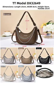 Detailed view of crescent shoulder bag featuring litchi texture and metal chain strap