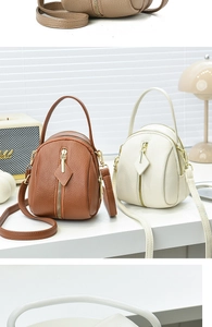 Detail of lychee textured leather mini bags in brown and white with dual zippers