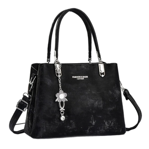 Black marble texture tote bag with silver hardware and adjustable shoulder strap