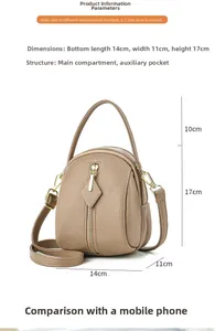 Detail view of khaki round crossbody bag showing dimensions 14cm x 11cm x 17cm