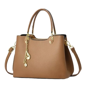 Brown lychee leather handbag for women with gold hardware and stylish chain charm
