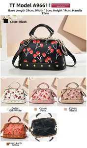 Detail view of cherry print boston bag in five colors with dimensions and golden rivets