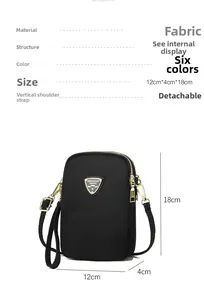 Detail view of black small square crossbody bag with dimensions 12x4x18 cm and gold zippers