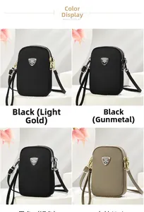 Nylon vertical mini crossbody phone bags in black and khaki with metallic logo details