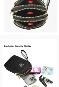 Detail view of the multi-layer zipper compartments and interior storage of this black bag
