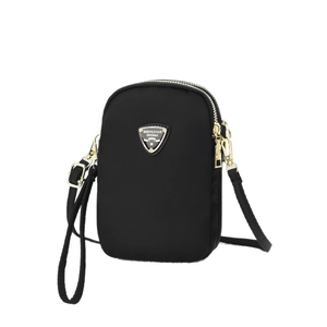 Classic black nylon crossbody bag with three zipper compartments and adjustable strap