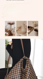 Detail of brown checkered tote bag with gold chain strap and elegant leather handle