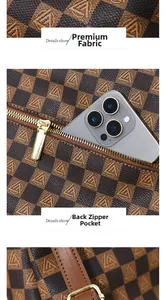 Detail view of brown checkered pattern fabric and functional rear zipper pocket for phone