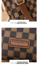 Detail shot of checkered shoulder bag with gold adjustment buckle and leather logo patch