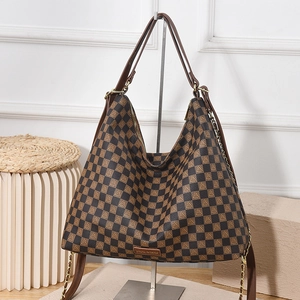 Classic brown checkered underarm bag with versatile dual straps and metal chain detail