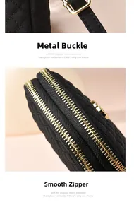 Close-up of golden hardware clasps and smooth zippers on black quilted nylon bag