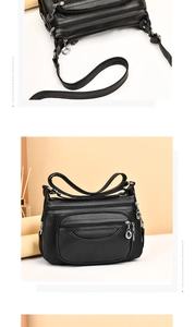 Detailed view of black multi-zipper leather bag with silver hardware and star charm