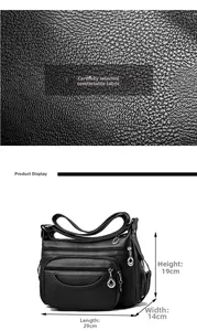 Detail view of black lychee grain PU leather bag with dimensions 29cm x 14cm x 19cm