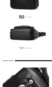 Detailed view of black litchi grain leather texture and star-shaped zipper head details