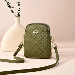 Olive green quilted nylon crossbody phone bag with gold metal logo and adjustable strap
