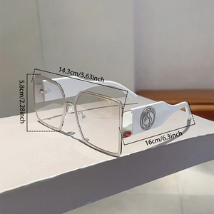 Detail showing oversized square frame sunglasses dimensions and silver metal hardware