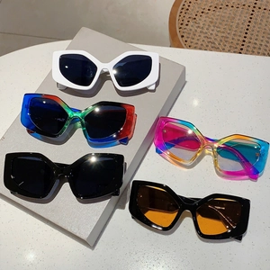Collection of colorful cat-eye sunglasses with thick geometric frames in various colors
