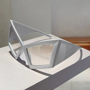 Macro shot of silver geometric triangle frames with futuristic metallic finish