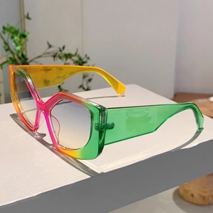 Detail of gradient rainbow cat eye sunglasses frame with polished acetate texture