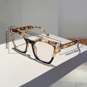 Detailed size chart for cat-eye glasses showing total width 14.1cm and frame height 5.2cm