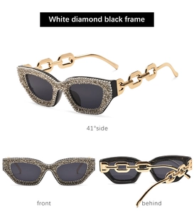 Detailansichten der schwarzen Cateye-Sonnenbrille mit Diamanten und goldenen Kettentempeln