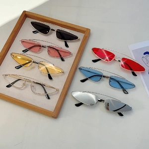 Collection of retro metal triangle sunglasses in multiple vibrant lens colors for street style
