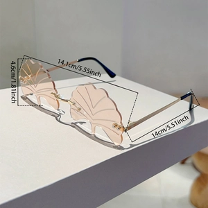 Frameless ginkgo leaf sunglasses detail showing dimensions 141mm width and peach lenses