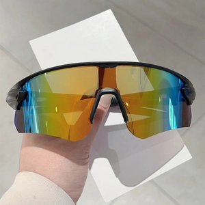 Macro detail of cycling sunglasses with rainbow iridescent lens and black frame