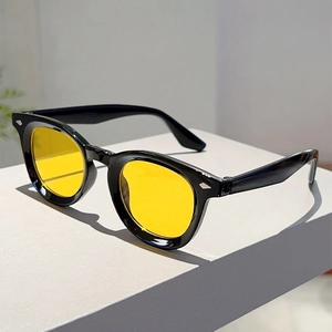 Retro round frame sunglasses with yellow lenses and silver arrow metal rivet details
