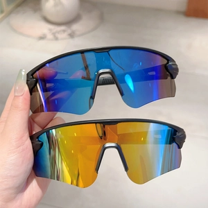Outdoor cycling sunglasses with blue-purple and gold-orange lenses and black frames