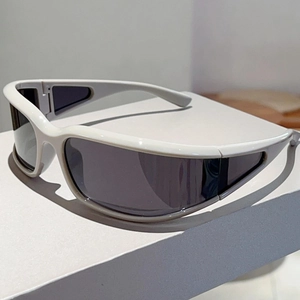 Close-up of white Y2K sports sunglasses with futuristic hollow temples and grey lenses