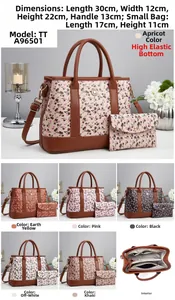 Detail view of printed floral tote bag set featuring vintage cherry pattern and PU leather texture