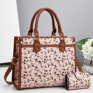 Beige tote bag with cherry print, brown leather handles and matching small wallet