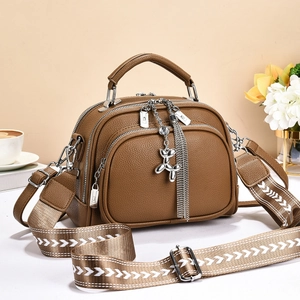 Brown lychee texture handbag with triple zipper and stylish patterned wide shoulder strap