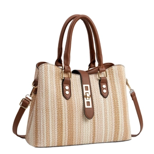 Sac à main tissé à rayures marron avec anses en cuir et fermoir en métal doré