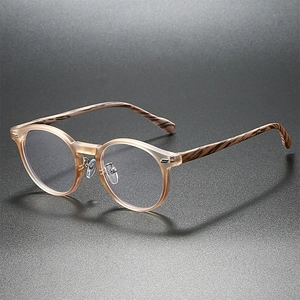 Retro-Rundbrille mit Bügeln in Holzoptik und champagnerfarbenen transparenten Rahmen