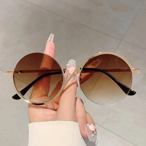 Lunettes de soleil rondes rétro oversize avec verres dégradés marron et cadre doré