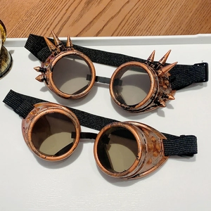 Detail of bronze steampunk goggles with spikes and rivets for retro cosplay outfits