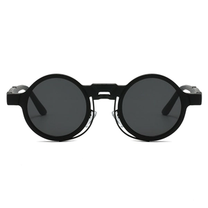 Front flat lay of retro round steampunk sunglasses with thick matte black frames