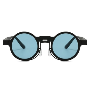 Detail of retro steampunk sunglasses featuring round black frames and blue lenses