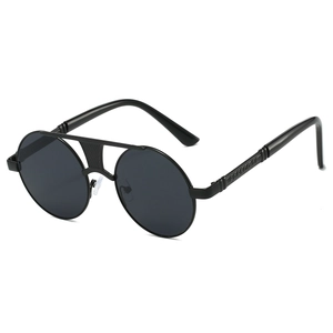 Detail view of double bridge black metal sunglasses frame with engraved temple textures