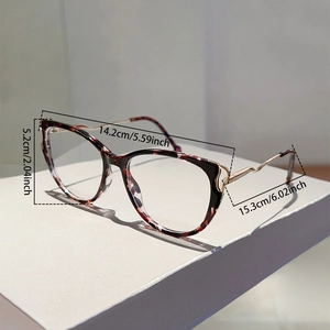 Cat eye glasses frame with leopard print front and golden wavy metal temples details