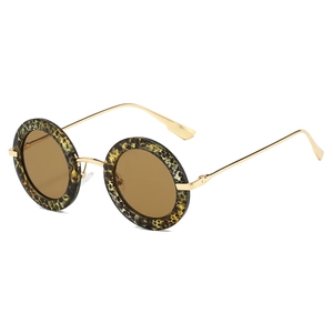 Vintage oval sunglasses with leopard print metal frame and brown lenses for women