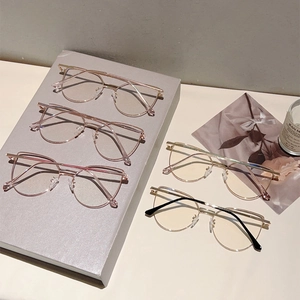 Detailed view of stylish oversized metal frame blue light glasses in various color options