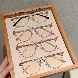Cat eye blue light glasses frames in four colors with gold metal temples and silicone nose pads