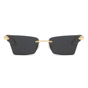 Lunettes de soleil rectangulaires sans monture avec relief guépard doré et verres gris