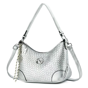 Detail of silver woven shoulder bag with metallic finish and tennis racket pendant