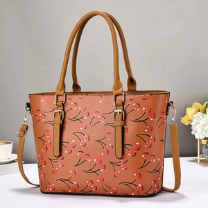 Classic brown tote bag with red cherry prints and adjustable shoulder strap for women